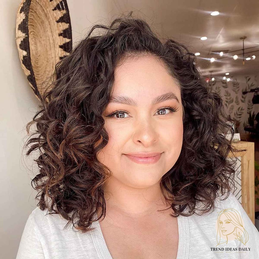 25 Cute Hairstyles For Medium Hair Curly Perfect for Your Next Salon Appointment 22 Beautiful Brown Curly Hair