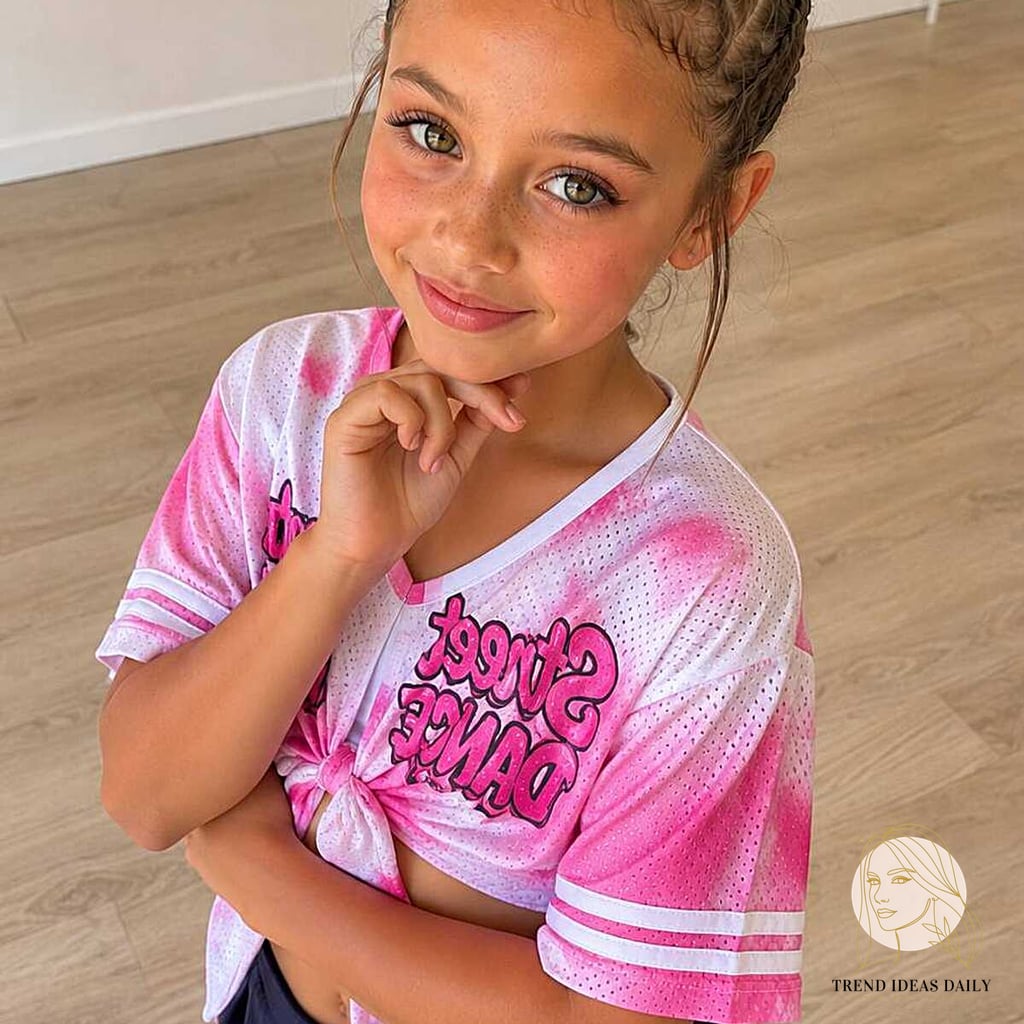 11 Easy Ponytail Hairstyles Medium We're Obsessed With Right Now 7 Double Dutch Braids into a Coiled Top Bun