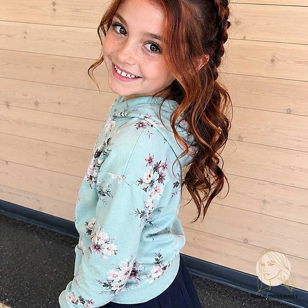 11 Easy Ponytail Hairstyles Medium We're Obsessed With Right Now 4 Dutch Braid Crown into Loose Curls