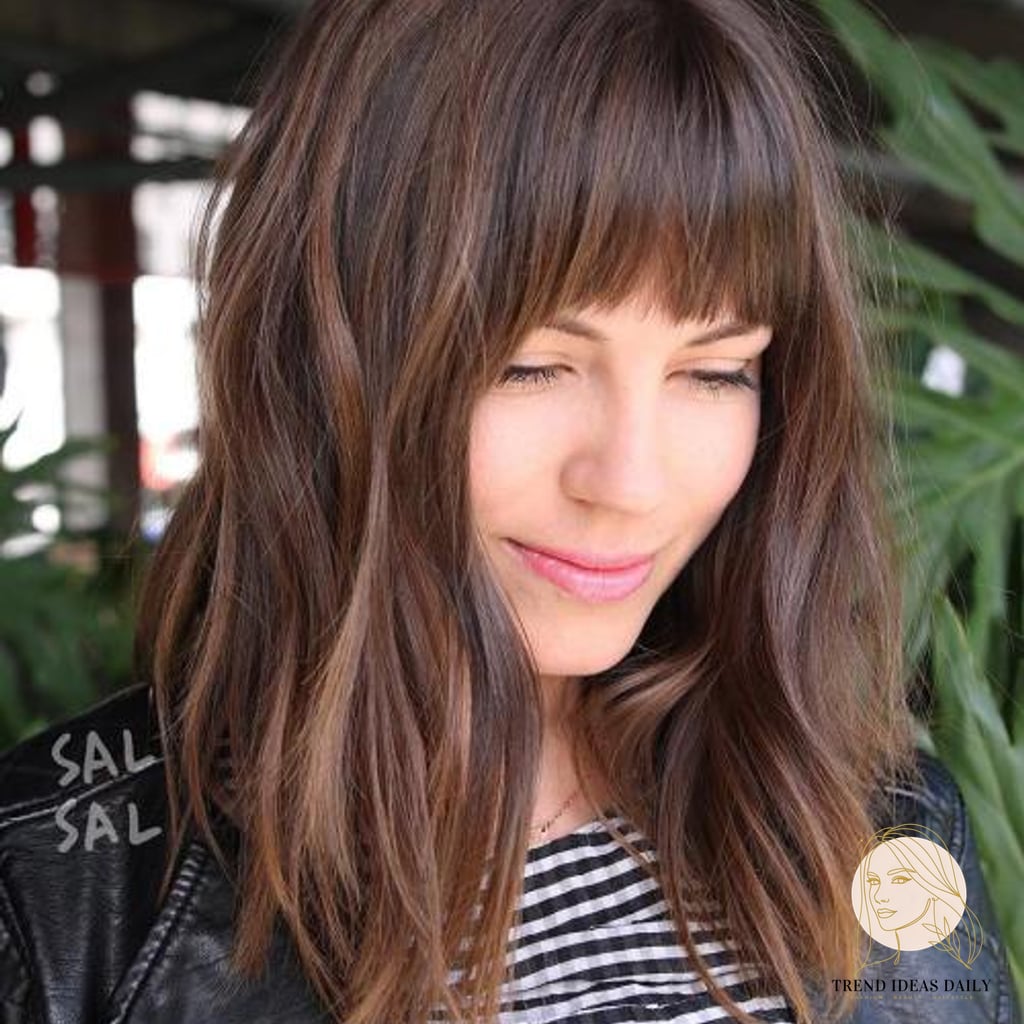 25 Pretty Hairstyles For Medium Hair for When You Need a Fresh Change 3 A-Line Cut with Bangs