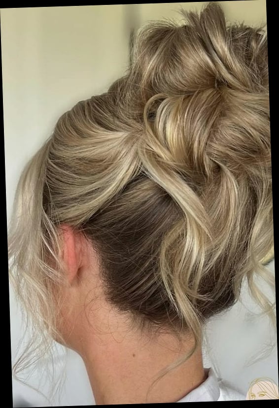 15 Glam Hairstyles For Short Hair Everyone Is Pinning Right Now 14 Messy Bun with Loose Curls