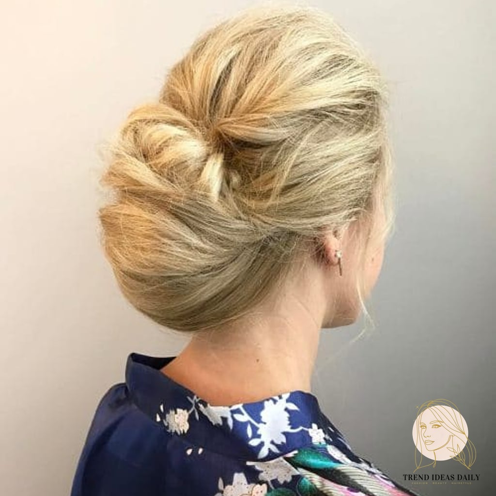 15 Glam Hairstyles For Short Hair Everyone Is Pinning Right Now 6 Modern Day Blonde Chignon