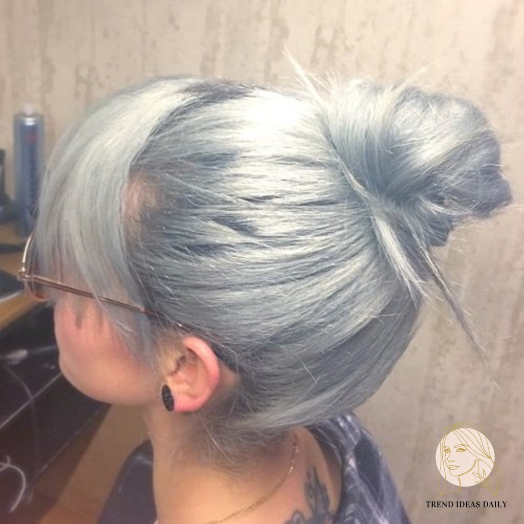 9 Bun Hairstyles Short Hair We're Obsessed With Right Now 4 Silver Bun with Long Bangs