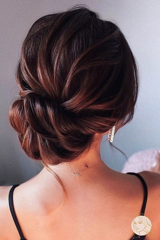 Sleek Low Bun with Deep Side Part