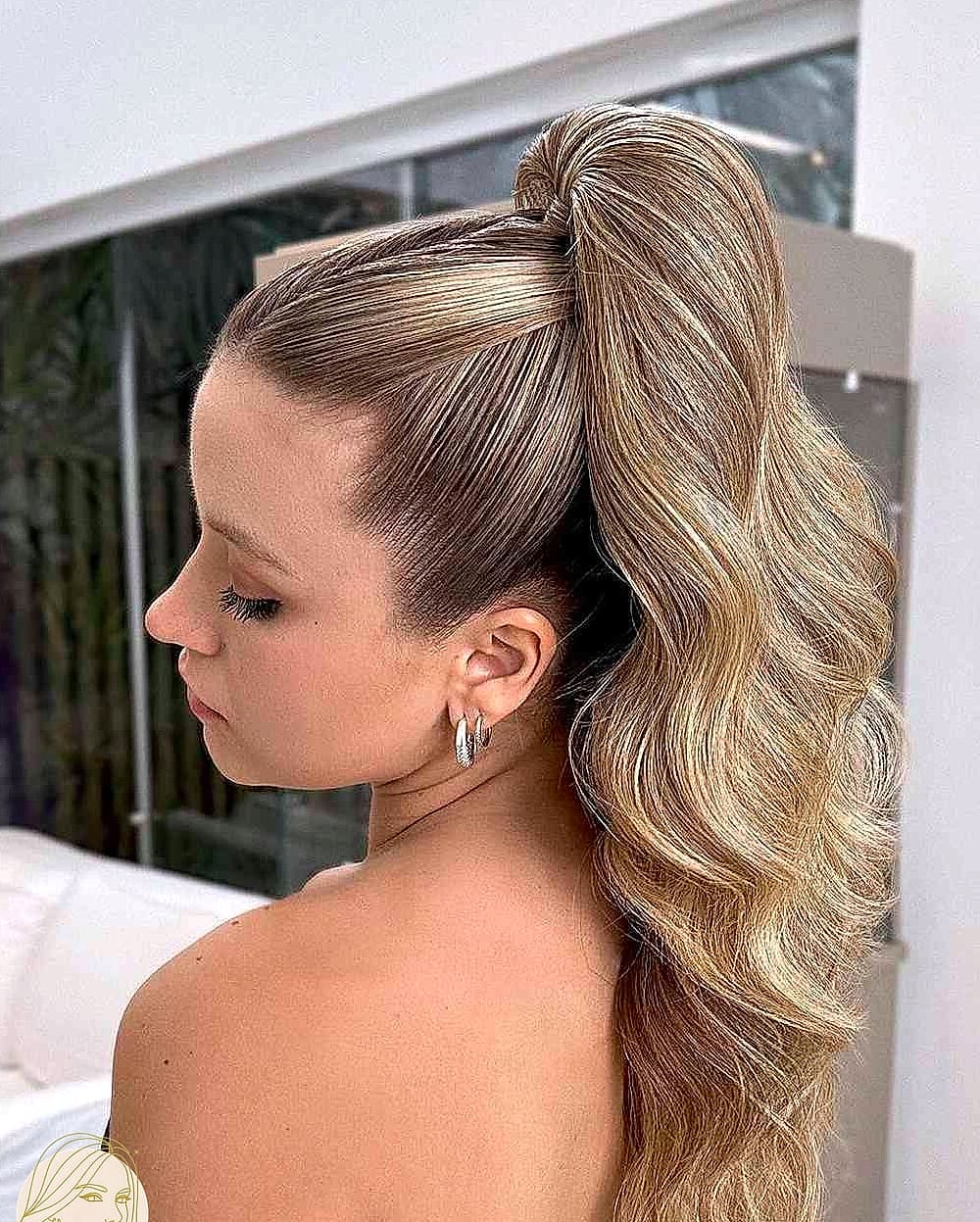 Slicked-Back Ponytail with Volume