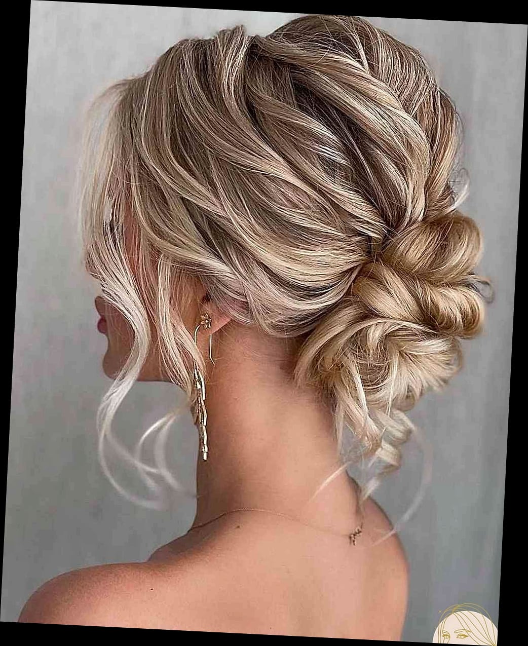 Soft Updo with Face-Framing Bangs and Loose Waves