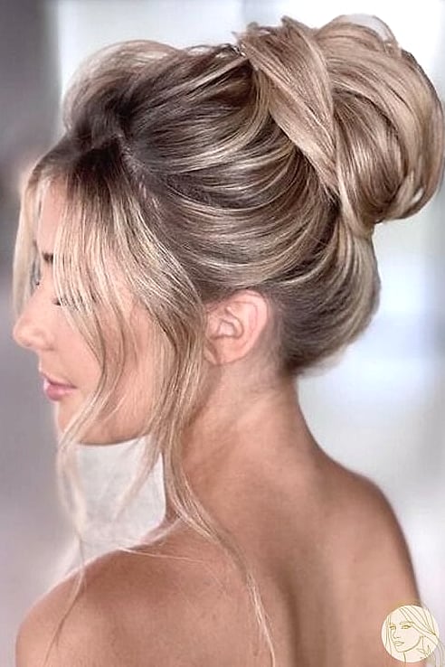 9 Bun Hairstyles Short Hair We're Obsessed With Right Now 3 Stunning Hairstyles for Long Faces