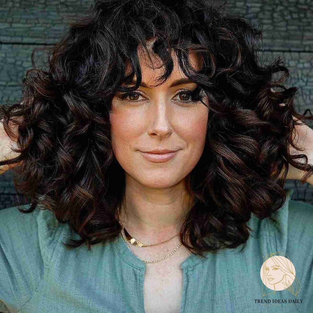 25 Cute Hairstyles For Medium Hair Curly Perfect for Your Next Salon Appointment 9 Thick and Full Curls