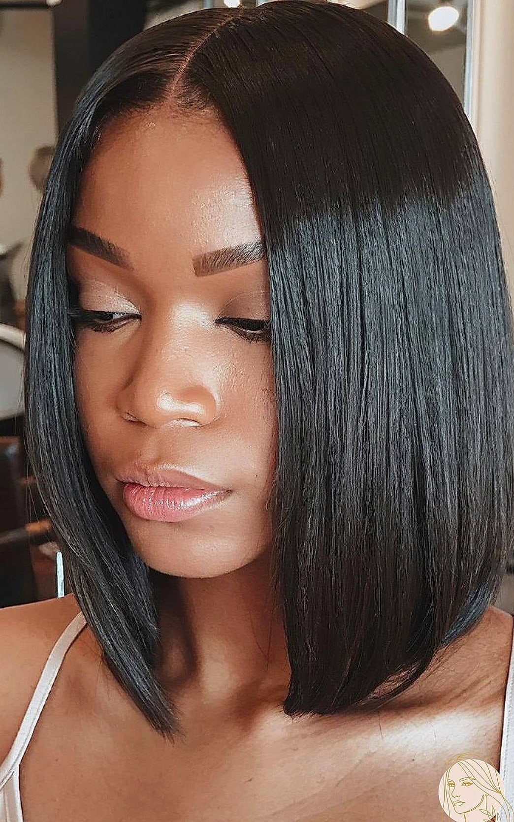 25 Silk Press Hairstyles Short Hair for When You Need a Fresh Change 24 Undercut Bob with Chunky Highlights